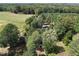 Aerial view showcasing a house surrounded by nature at 6349 Elevation Rd, Benson, NC 27504