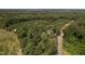 House nestled in woods, viewed from above at 6349 Elevation Rd, Benson, NC 27504