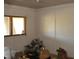 Empty room with window and stacked containers at 6349 Elevation Rd, Benson, NC 27504