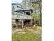 Elevated deck with stairs leading down to the backyard at 3419 Oak Trl, Clayton, NC 27520