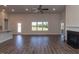 Spacious living area with hardwood floors, fireplace and access to kitchen at 110 Lemon Drop Ln, Franklinton, NC 27525