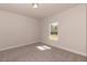 Simple bedroom with carpet and a window at 110 Lemon Drop Ln, Franklinton, NC 27525