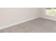Simple bedroom with carpeted floor and a window at 110 Lemon Drop Ln, Franklinton, NC 27525