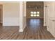 Bright and spacious entryway with wood-look floors and views to the living room at 110 Lemon Drop Ln, Franklinton, NC 27525