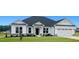 Craftsman style home with white siding and gray roof at 110 Lemon Drop Ln, Franklinton, NC 27525