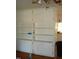 Built-in shelving unit with ample storage space at 6383 Elevation Rd, Benson, NC 27504