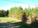 Wooden fence bordering the property's edge at 6383 Elevation Rd, Benson, NC 27504