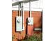 Exterior brick wall with electric meter and box at 6383 Elevation Rd, Benson, NC 27504