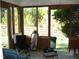 Bright sunroom with view of backyard at 6383 Elevation Rd, Benson, NC 27504