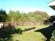 Grass yard with two barbecue grills at 6383 Elevation Rd, Benson, NC 27504