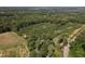 Wide aerial view of property and surrounding land at 6383 Elevation Rd, Benson, NC 27504