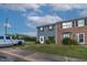 Front view of townhome with landscaping and parking at 1812 Orange Grove Rd # 101, Hillsborough, NC 27278