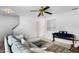 Living room with gray sectional sofa and built in shelving at 1812 Orange Grove Rd # 101, Hillsborough, NC 27278