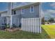 Rear exterior view showing a private patio and fenced yard at 1812 Orange Grove Rd # 101, Hillsborough, NC 27278