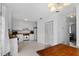 Kitchen with white cabinets, wood countertops and access to dining area at 1812 Orange Grove Rd # 101, Hillsborough, NC 27278
