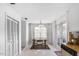 Dining area with table, chairs and french doors leading to a patio at 1812 Orange Grove Rd # 101, Hillsborough, NC 27278