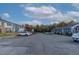 View of the community with ample parking for residents and visitors at 1812 Orange Grove Rd # 101, Hillsborough, NC 27278