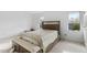 Spacious bedroom with carpeted floor, large windows, and built-in storage at 1812 Orange Grove Rd # 101, Hillsborough, NC 27278