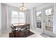 Dining area with table and chairs, and access to backyard patio at 1812 Orange Grove Rd # 101, Hillsborough, NC 27278