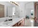Double vanity bathroom with a view into a bedroom at 1812 Orange Grove Rd # 101, Hillsborough, NC 27278