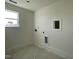 Unfinished laundry room with hookups for washer/dryer at 1505 Maelyn Way, Fuquay Varina, NC 27526