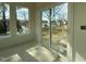 Sunroom with deck access and ample natural light at 1505 Maelyn Way, Fuquay Varina, NC 27526