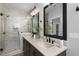 Spa-like bathroom featuring double sinks, a walk-in shower, and elegant fixtures at 901 Myers Point Dr # 17, Morrisville, NC 27560