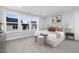 Spacious bedroom with large windows and neutral decor at 901 Myers Point Dr # 17, Morrisville, NC 27560