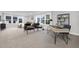 Main bedroom with carpeted floors, large windows, and a sitting area at 901 Myers Point Dr # 17, Morrisville, NC 27560