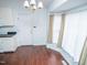 Bright dining area with hardwood floors and a bay window at 6220 Sweden Dr, Raleigh, NC 27612