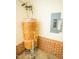 Unfinished mechanical room with water heater and electrical panel at 6220 Sweden Dr, Raleigh, NC 27612