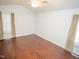 Spacious bedroom with hardwood floors and neutral walls at 6220 Sweden Dr, Raleigh, NC 27612