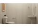 Small bathroom with pedestal sink and toilet at 512 Hester Rd, Durham, NC 27703