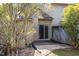 Private backyard patio with gravel and mature landscaping at 14 Stone Village Ct, Durham, NC 27704