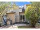Private backyard patio with gravel and mature landscaping at 14 Stone Village Ct, Durham, NC 27704