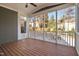 Relaxing screened porch with wood flooring and backyard view at 2618 Needle Pine Dr, Apex, NC 27539