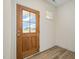 Bright entryway with wood door and hardwood floors at 67 Earl Ct, Smithfield, NC 27577