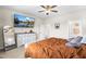 Main bedroom with dresser and large TV at 181 Glenwood Pl, Kenly, NC 27542