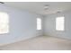 Spacious bedroom with light walls and carpeted floor at 3701 Swann St, Raleigh, NC 27612