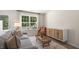 Spacious living room with comfortable seating and large windows at 131 Holmes Corner Dr, Smithfield, NC 27577