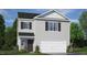 Two-story house with gray siding and two-car garage at 236 Holton St, Smithfield, NC 27577