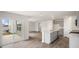 Bright dining area with large window and wood-look flooring at 236 Holton St, Smithfield, NC 27577