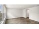 Spacious living room with wood-look floors and neutral color palette at 236 Holton St, Smithfield, NC 27577