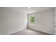 Simple bedroom with carpeted floor and window at 236 Holton St, Smithfield, NC 27577
