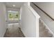 Bright entryway with stairs leading to the upper level at 236 Holton St, Smithfield, NC 27577