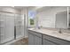 Double vanity bathroom with a large shower at 236 Holton St, Smithfield, NC 27577