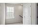 Upstairs landing with linen closet and access to bedrooms at 236 Holton St, Smithfield, NC 27577