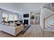 Open living room with hardwood floors and staircase at 904 Delano Dr, Knightdale, NC 27545