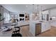 Open concept kitchen and living area with hardwood floors at 904 Delano Dr, Knightdale, NC 27545