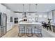 Modern kitchen with stainless steel appliances and island at 904 Delano Dr, Knightdale, NC 27545